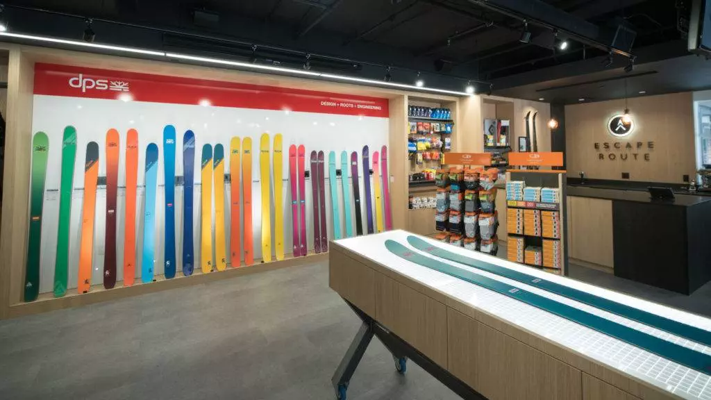 A vibrant showcase of skis in a ski store, perfect for skiing enthusiasts or those planning a trip to Whistler.