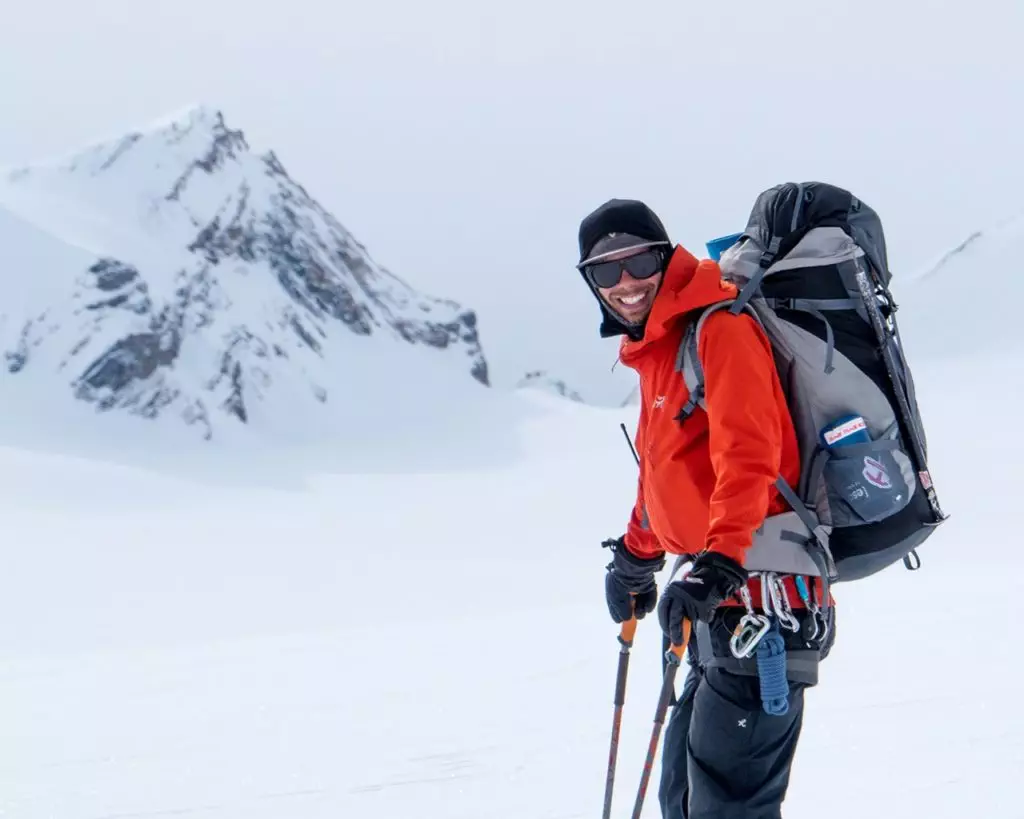Backcountry ski and splitboard guide during overnight hut tour