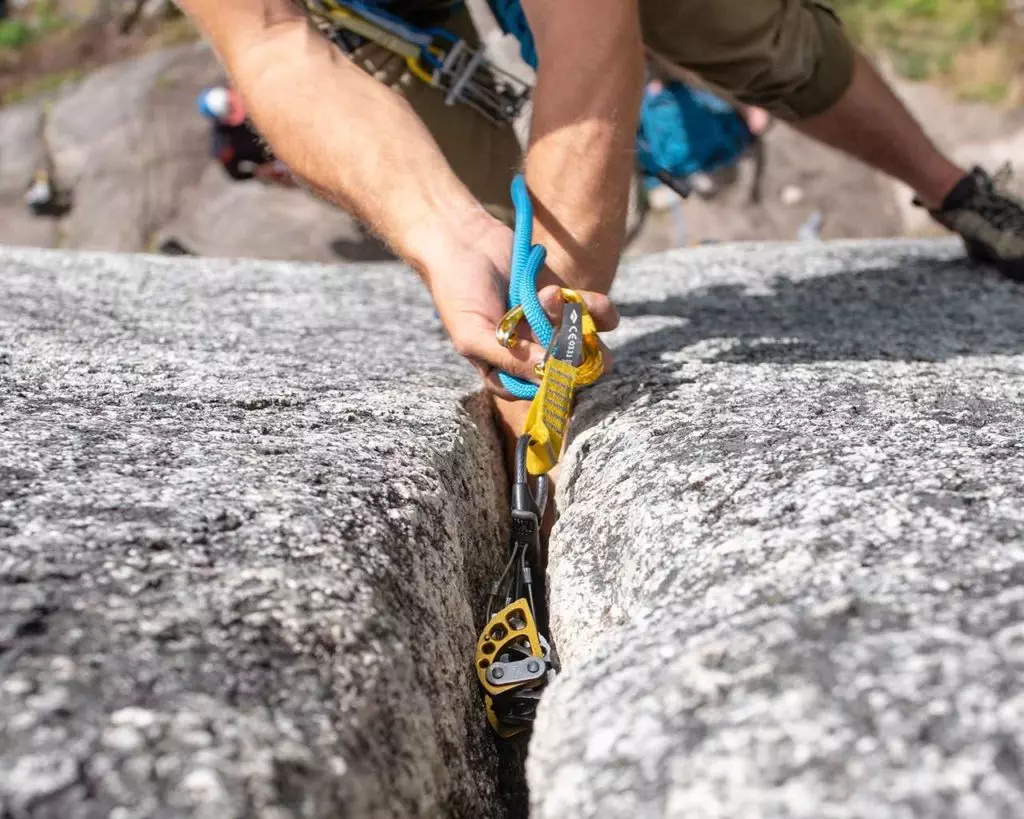 Placing rock climbing gear in rock